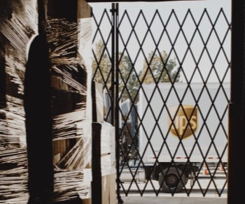 Boxes in gated area in warehouse