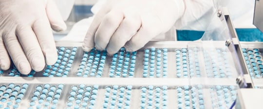 Generic pharmaceuticals being packed for shipment in Healthcare supply chain facility