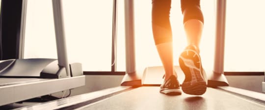 Woman working out on treadmill