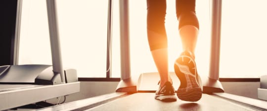 Woman working out on treadmill