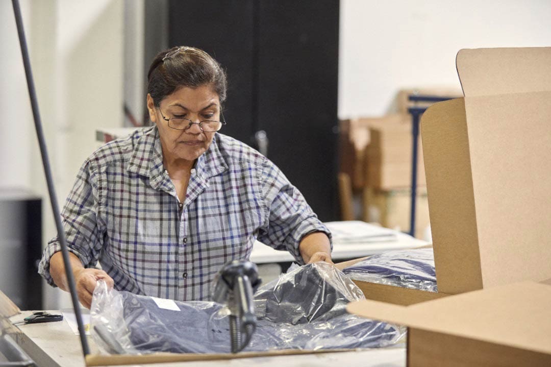 UPS employee doing quality check at distribution and fulfillment center