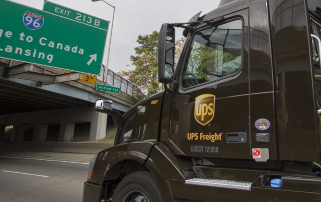 UPS freight truck delivering to customer's warehouse