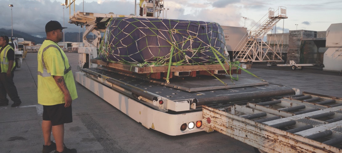 Cowling being loaded on an airplane to fly to Hawaii