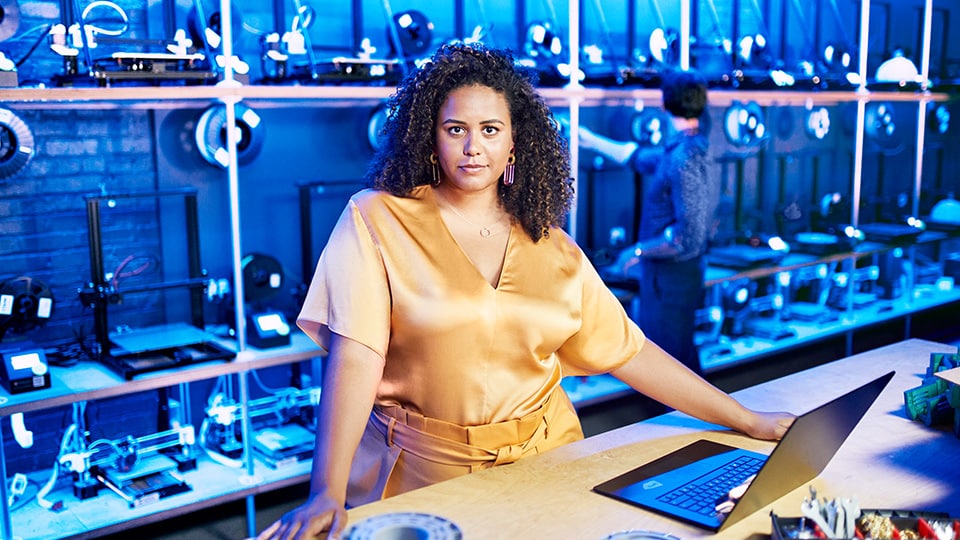 Unstoppable woman in lab with laptop